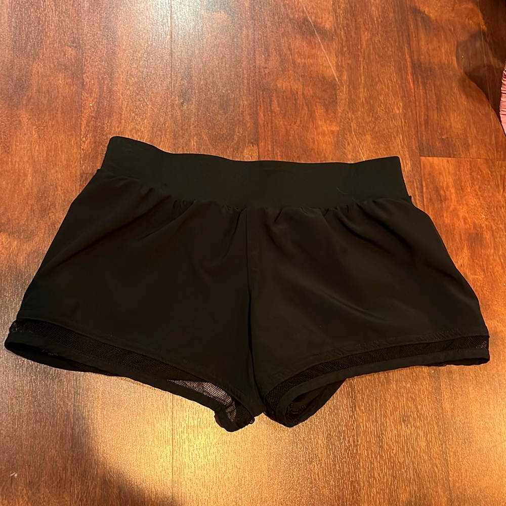Size s amazon black running shorts with mesh detail on bottom